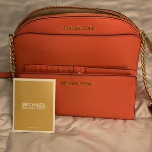 Michael Kors cross bag with wallet.
